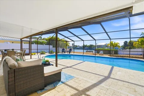 a view of a living room with a couch and a table