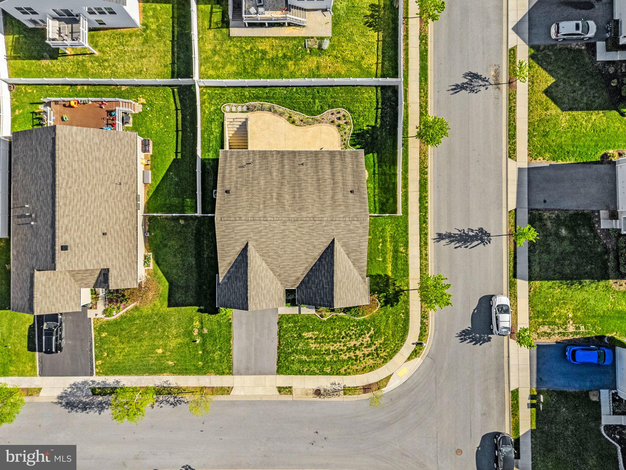 181 Sparkling Brook Road Ranson, WV 25438 - Photo 101 of 101 an aerial view of a house with a garden and plants
