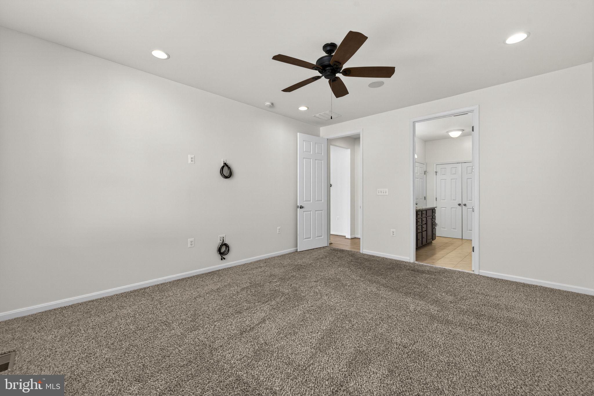181 Sparkling Brook Road Ranson, WV 25438 - Photo 52 of 101 a view of an empty room