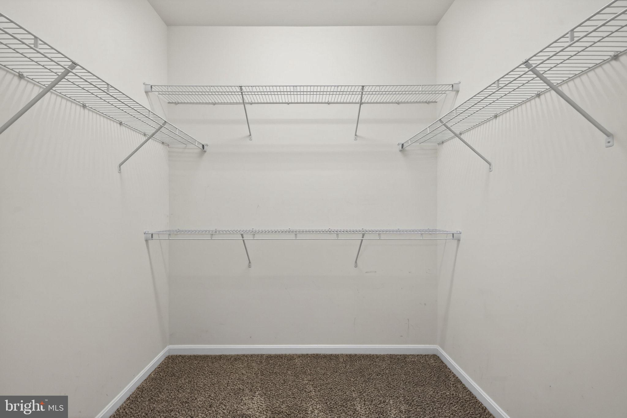 181 Sparkling Brook Road Ranson, WV 25438 - Photo 59 of 101 a view of a room with racks on the wall