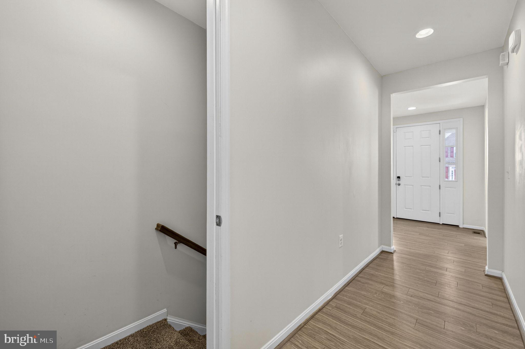 181 Sparkling Brook Road Ranson, WV 25438 - Photo 61 of 101 a view of a room with wooden floor
