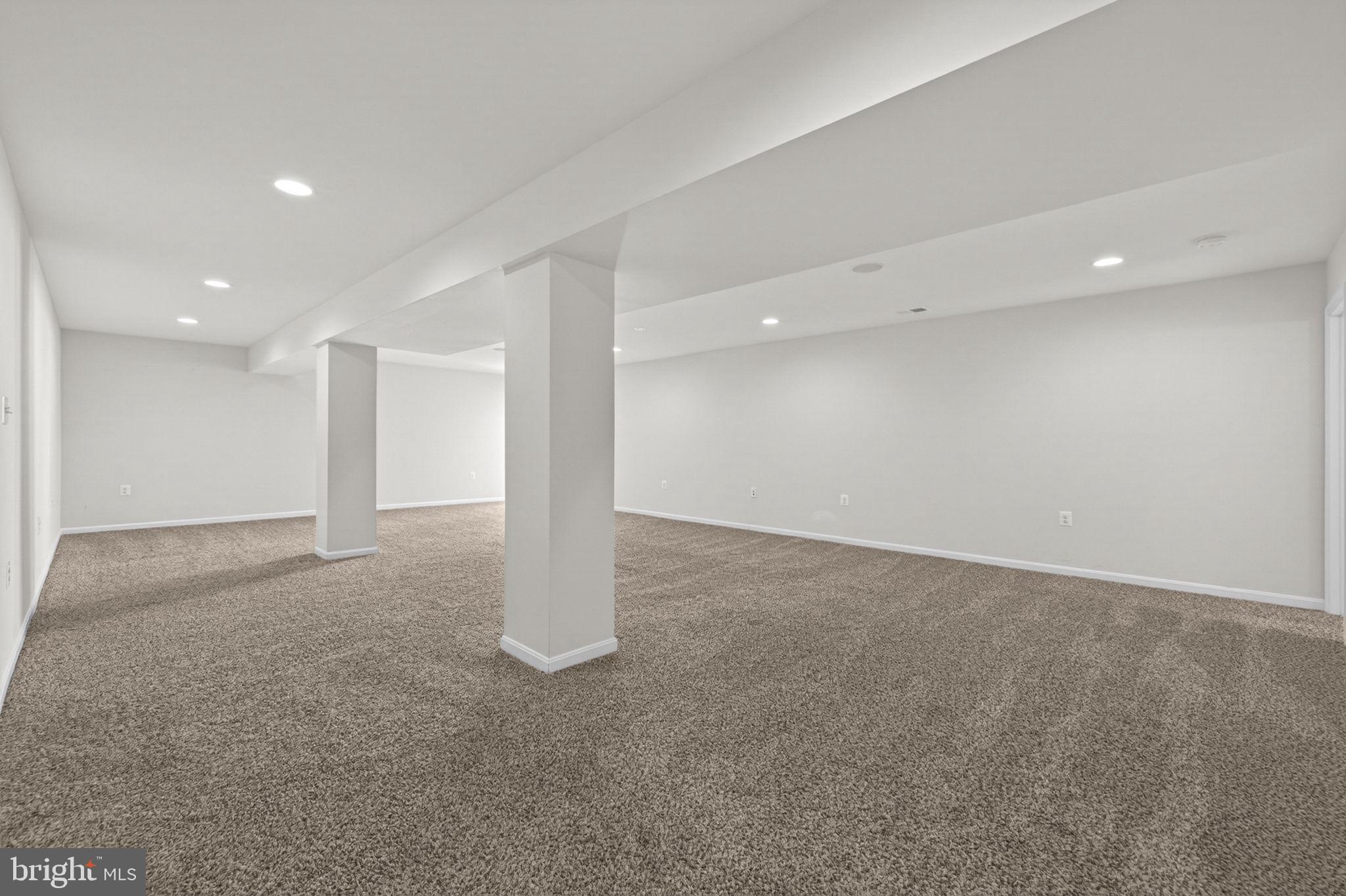 181 Sparkling Brook Road Ranson, WV 25438 - Photo 63 of 101 a view of a big room with a fireplace