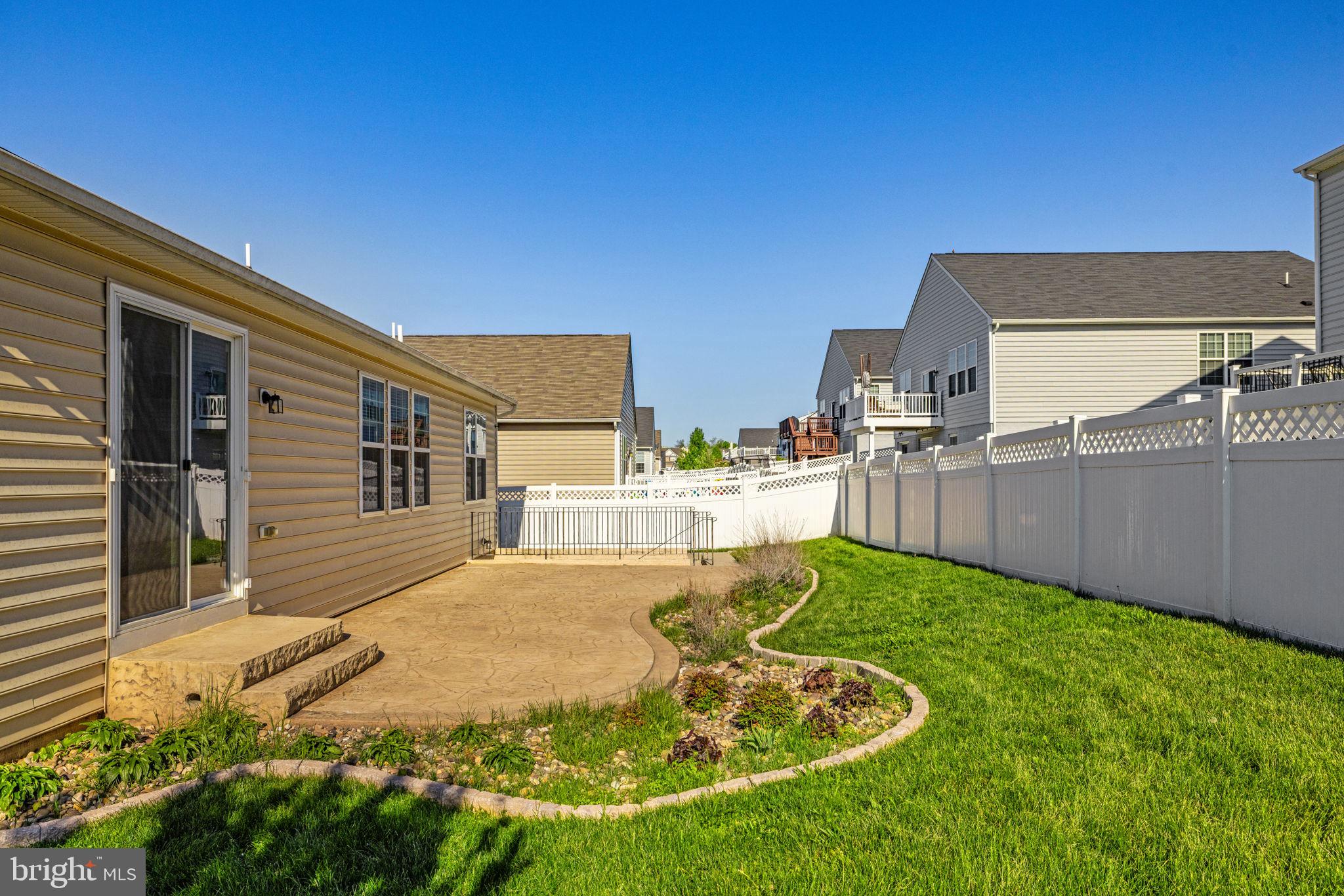 181 Sparkling Brook Road Ranson, WV 25438 - Photo 84 of 101 a view of a backyard with plants