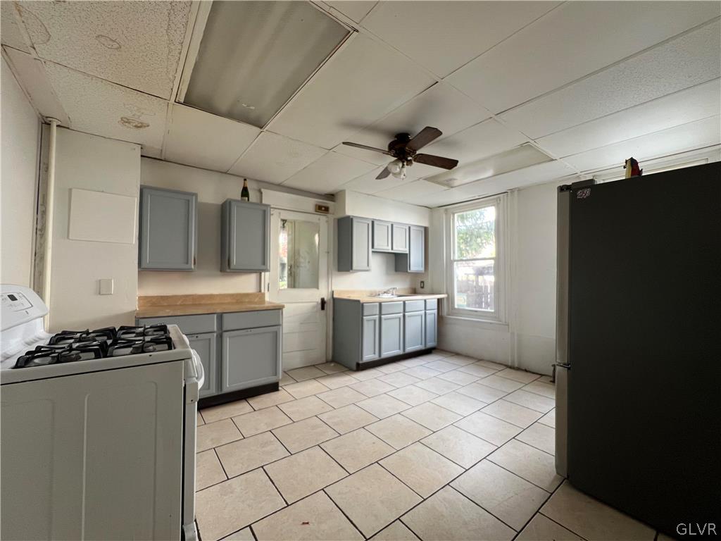 644 William Street Bethlehem, PA 18015 - Photo 4 of 15 a kitchen with a sink appliances cabinets and a counter top space