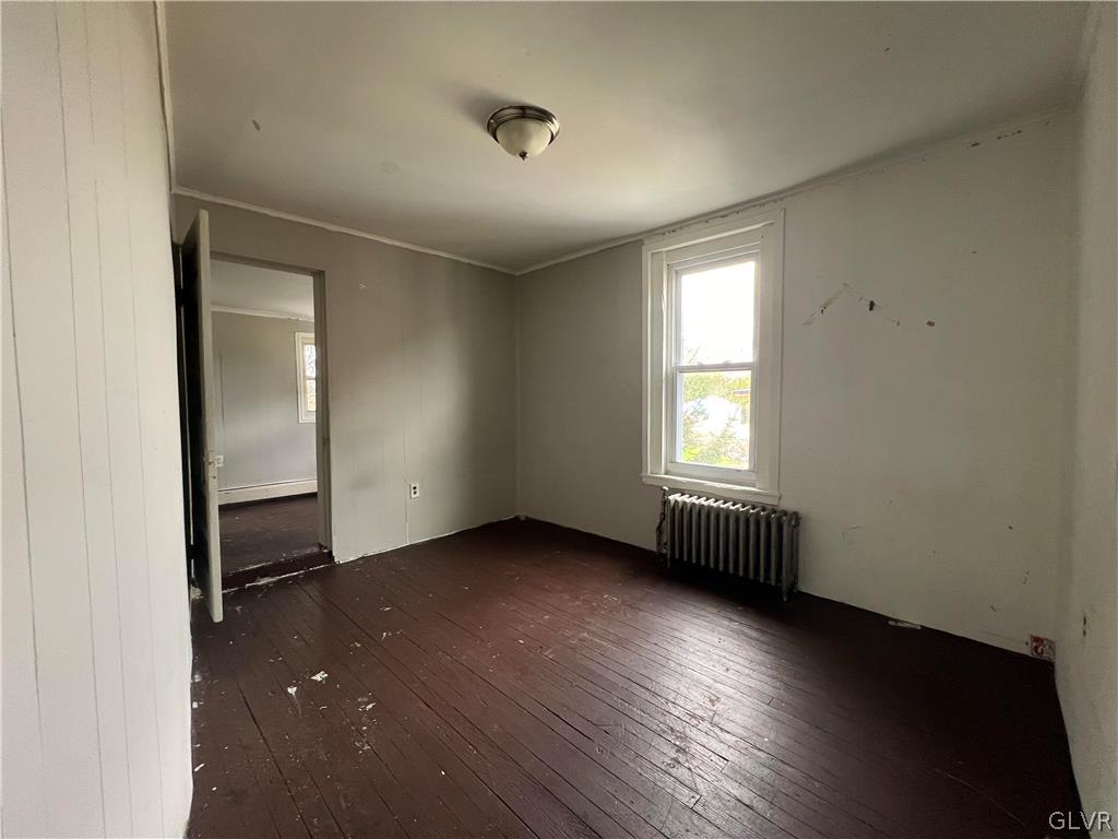 644 William Street Bethlehem, PA 18015 - Photo 10 of 15 an empty room with wooden floor and windows