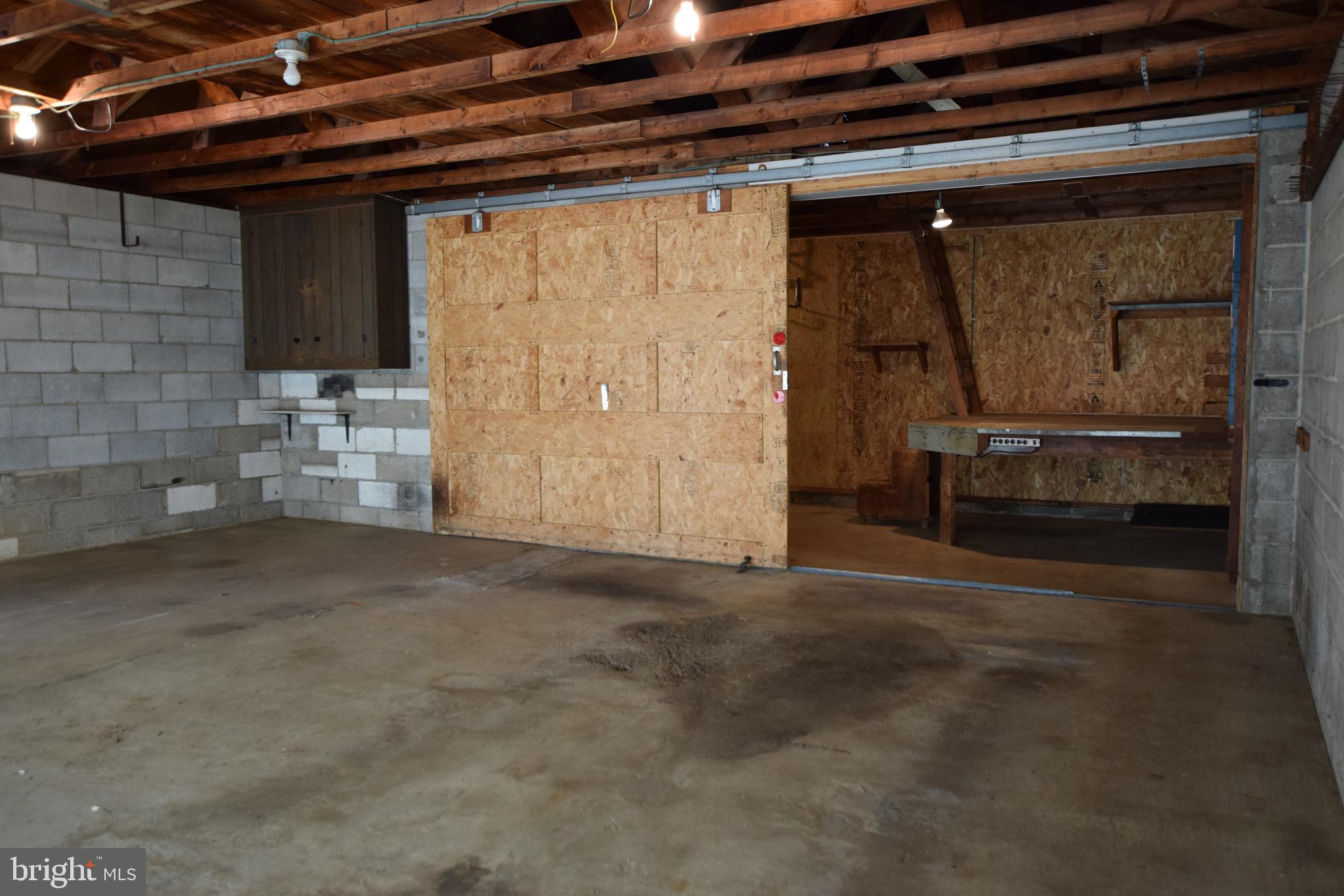162 Hook Road Westminster, MD 21157 - Photo 41 of 44 Garage has Sliding Door to Rear Workshop