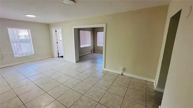 an empty room with windows