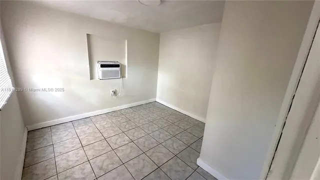 a view of a livingroom with wooden floor