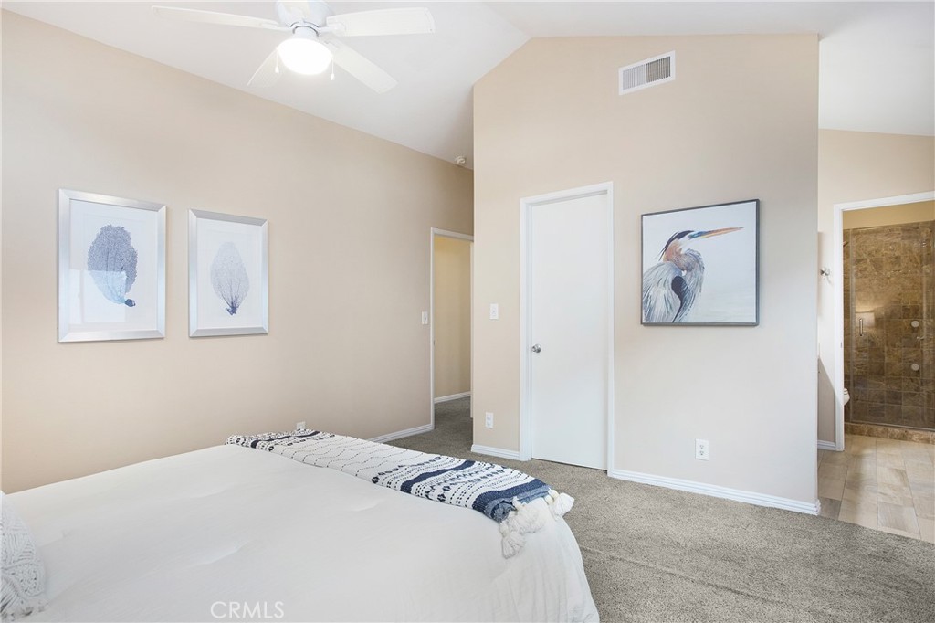 326 17th Street Seal Beach, CA 90740 - Photo 13 of 26 a bedroom with bed and wall painting