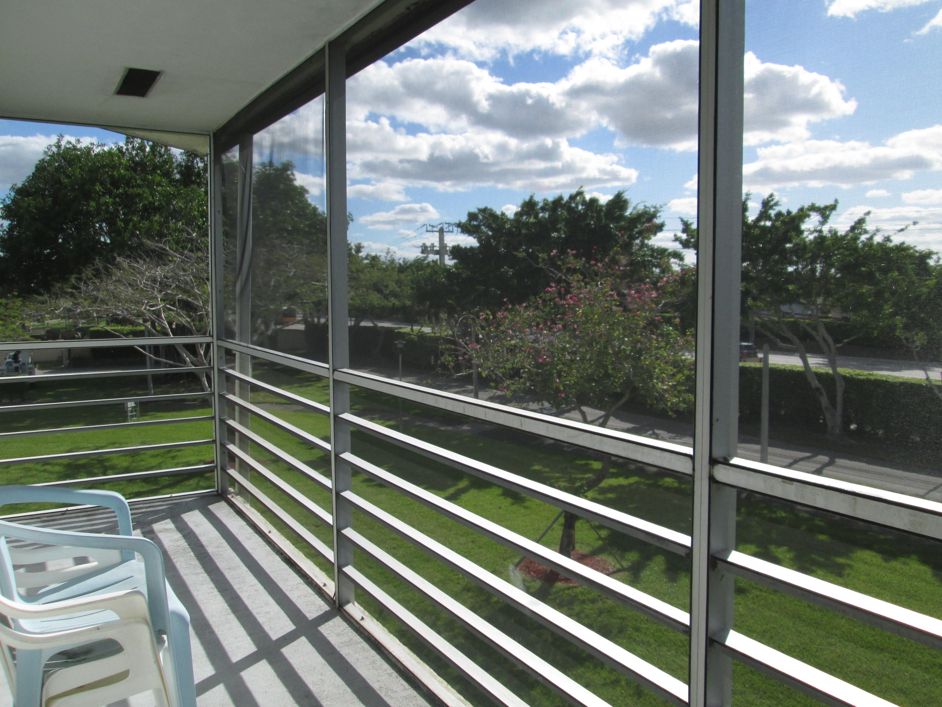 291 Suffolk F, Unit CORNER Boca Raton, FL 33434 - Photo 1 of 22 patio view