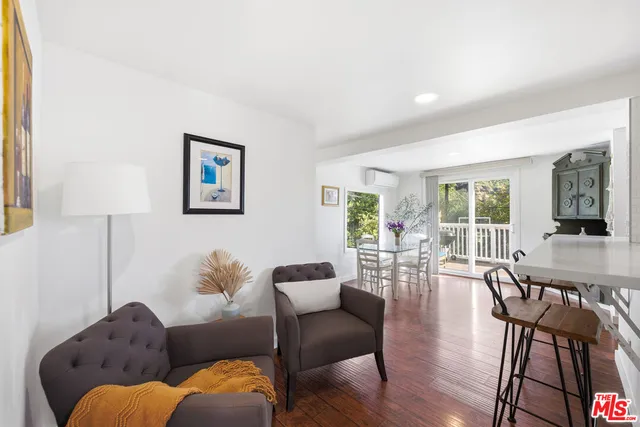 a kitchen with wooden cabinets and a stove top oven