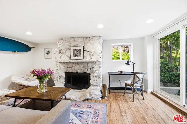 a spacious bathroom with a granite countertop sink a toilet and shower