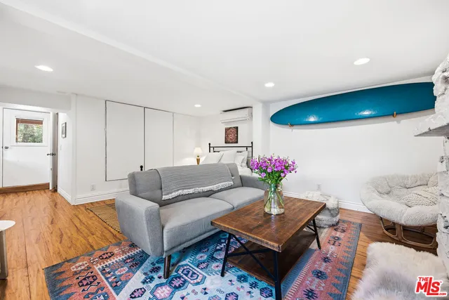 a view of a roof deck with wooden fence