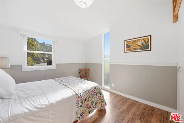 a hallway with furniture and front door