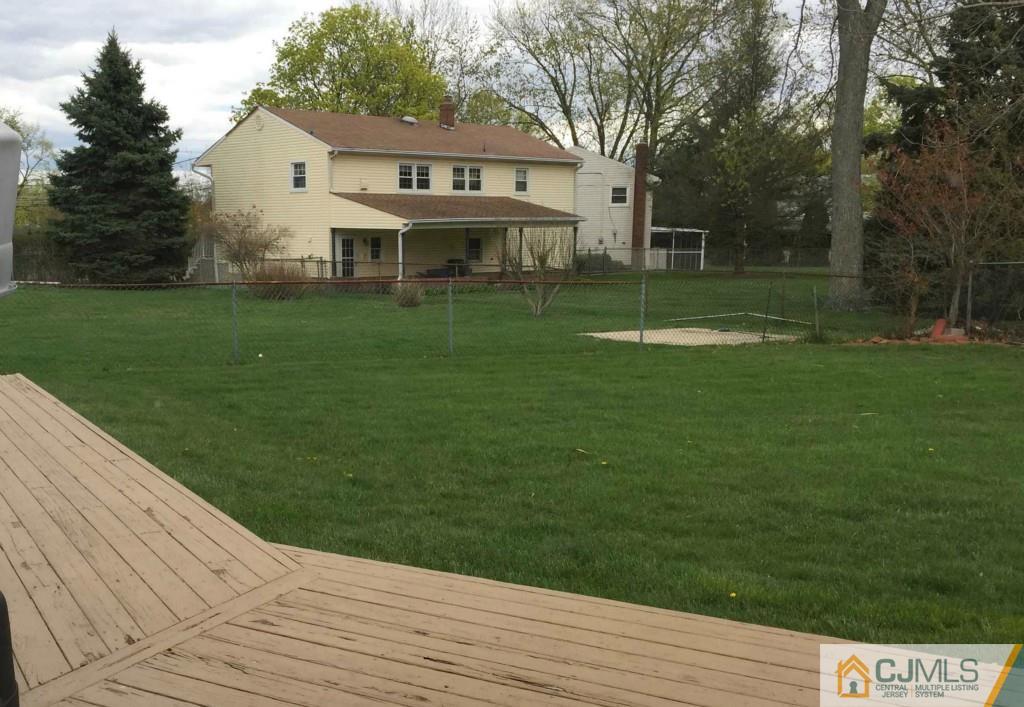 6 Idlewild Road Edison, NJ 08817 - Photo 14 of 15 a view of a house with a yard
