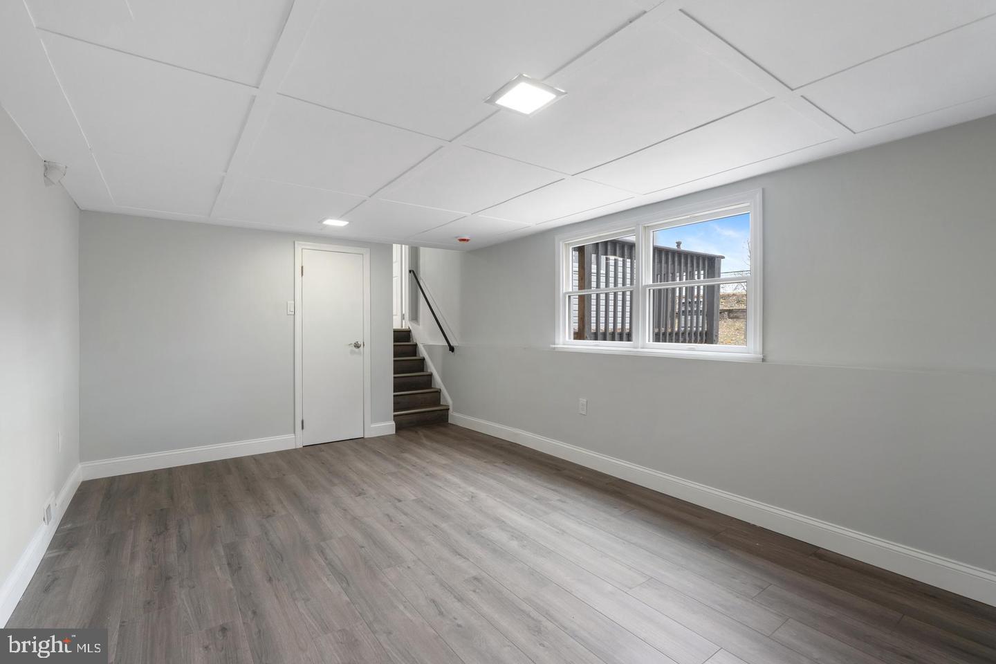 315 Ogden Sta Road Wenonah, NJ 08090 - Photo 9 of 10 a view of an empty room with a window and wooden floor