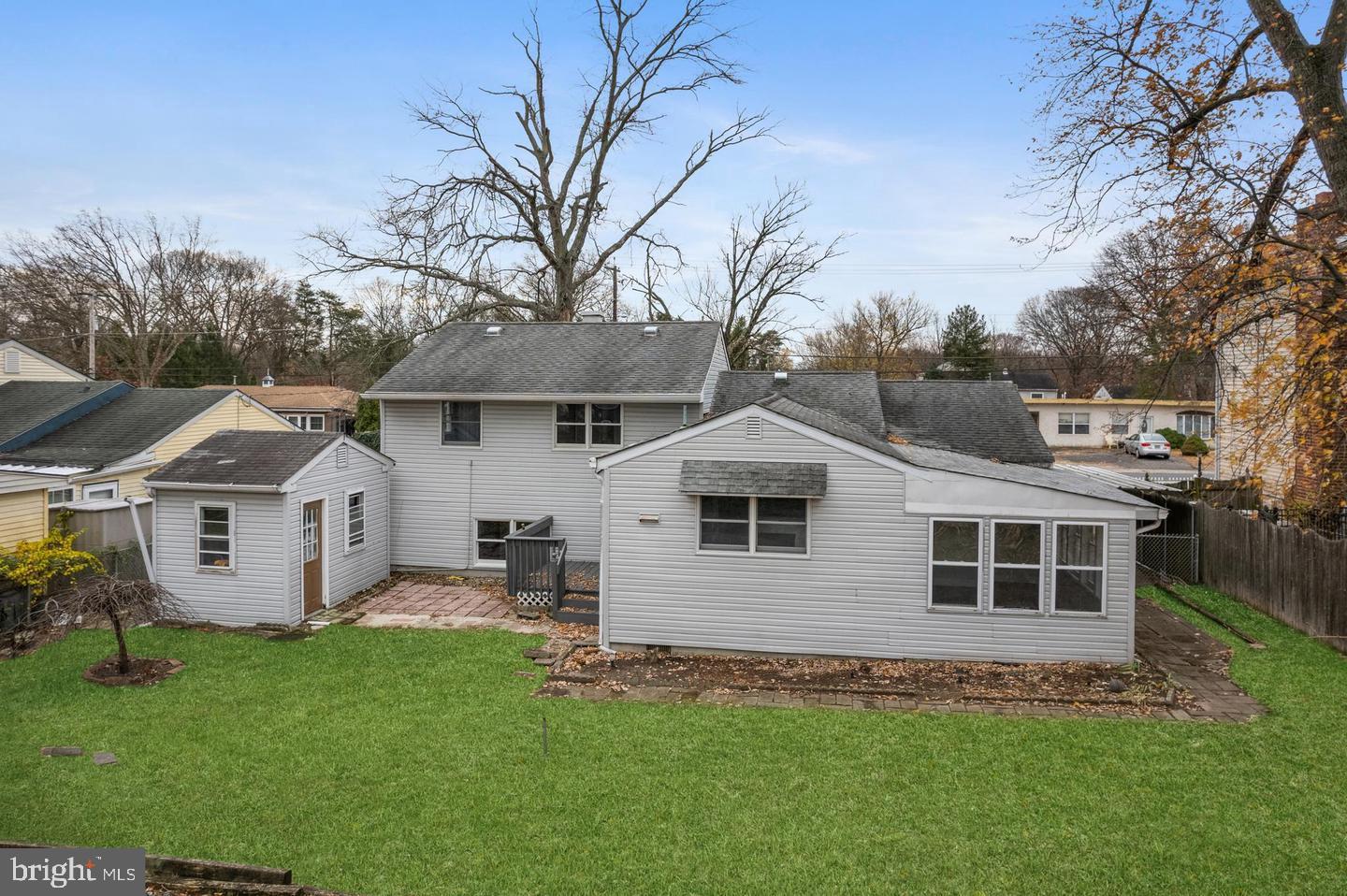 315 Ogden Sta Road Wenonah, NJ 08090 - Photo 10 of 10 a front view of a house with a garden