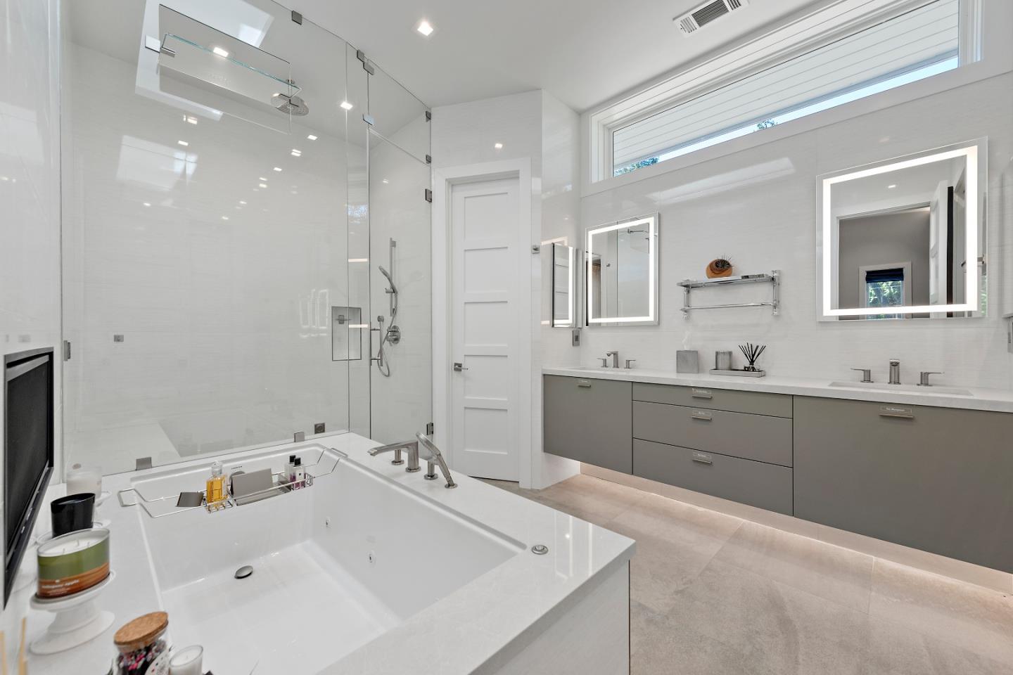 88 Park Drive Atherton, CA 94027 - Photo 18 of 40 a spacious bathroom with a tub sink and mirror