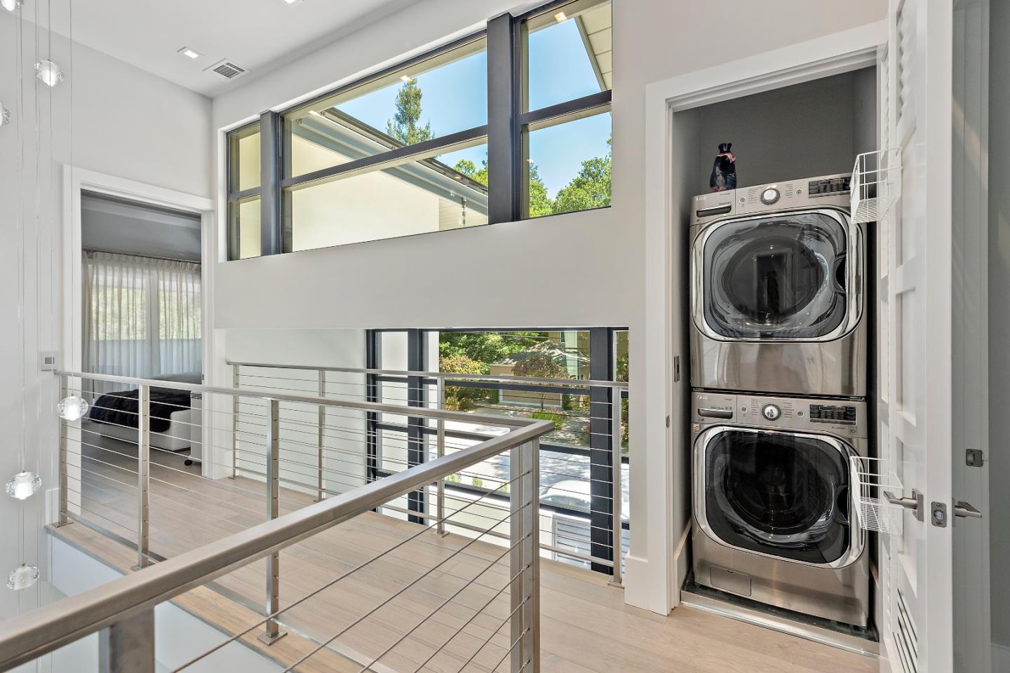 88 Park Drive Atherton, CA 94027 - Photo 24 of 40 a view of a hallway with washer and dryer in a room