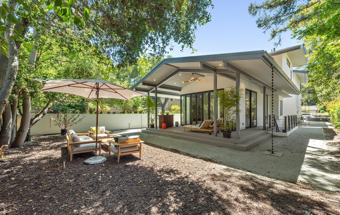 88 Park Drive Atherton, CA 94027 - Photo 35 of 40 a view of a house with backyard porch and sitting area