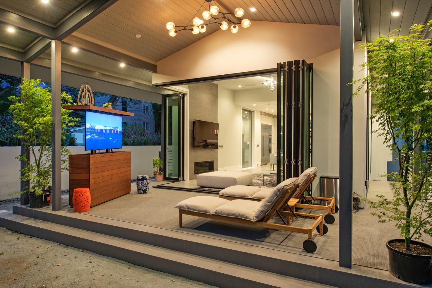 88 Park Drive Atherton, CA 94027 - Photo 36 of 40 a outdoor living space with furniture and a potted plant