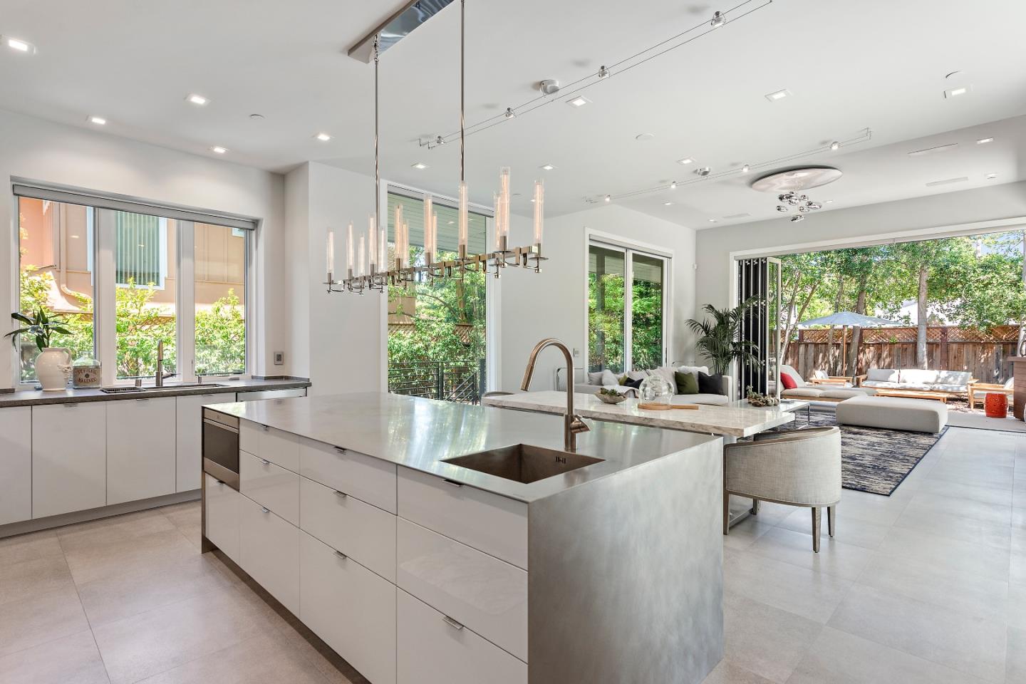 88 Park Drive Atherton, CA 94027 - Photo 4 of 40 a large white kitchen with a large window and stainless steel appliances