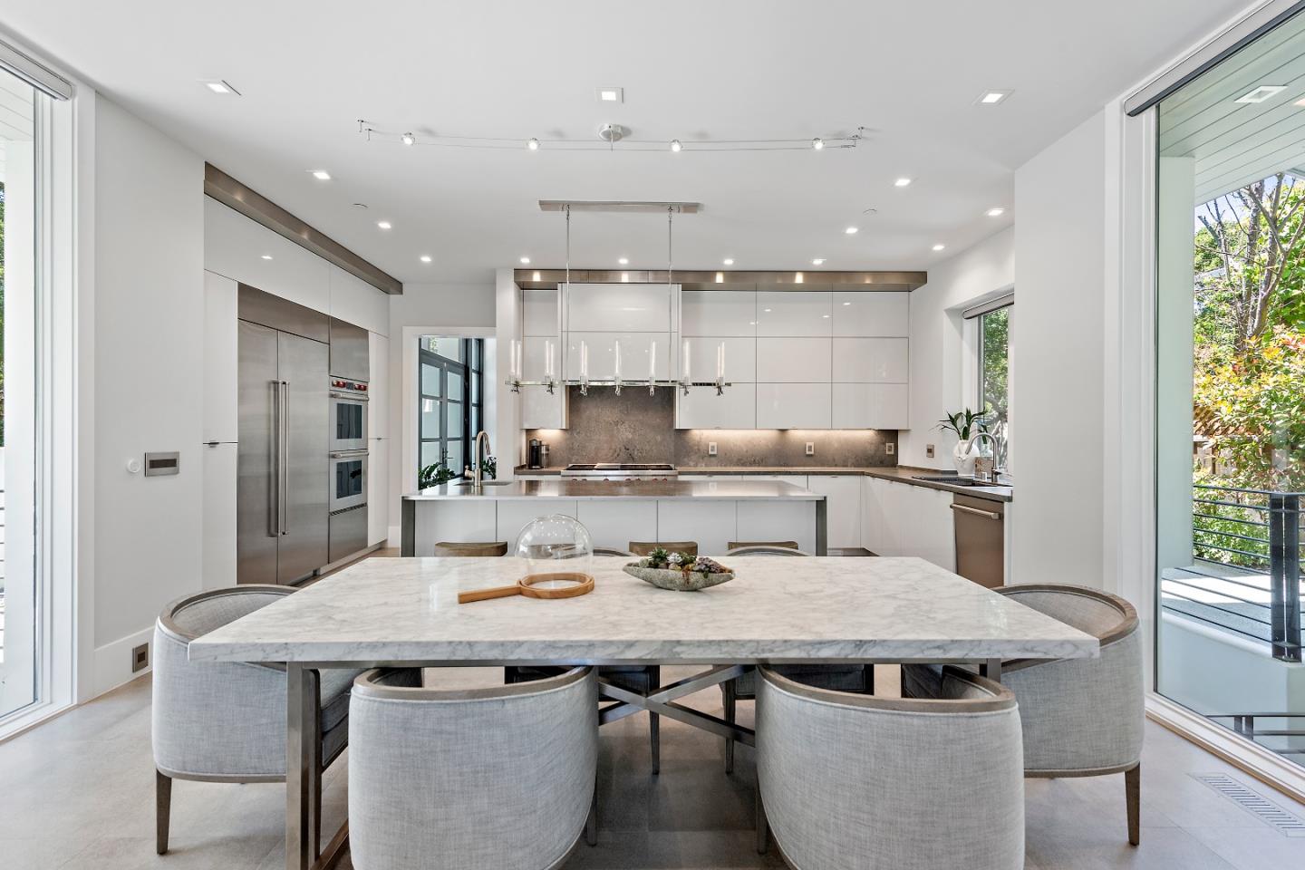 88 Park Drive Atherton, CA 94027 - Photo 6 of 40 a kitchen with a table and chairs in it