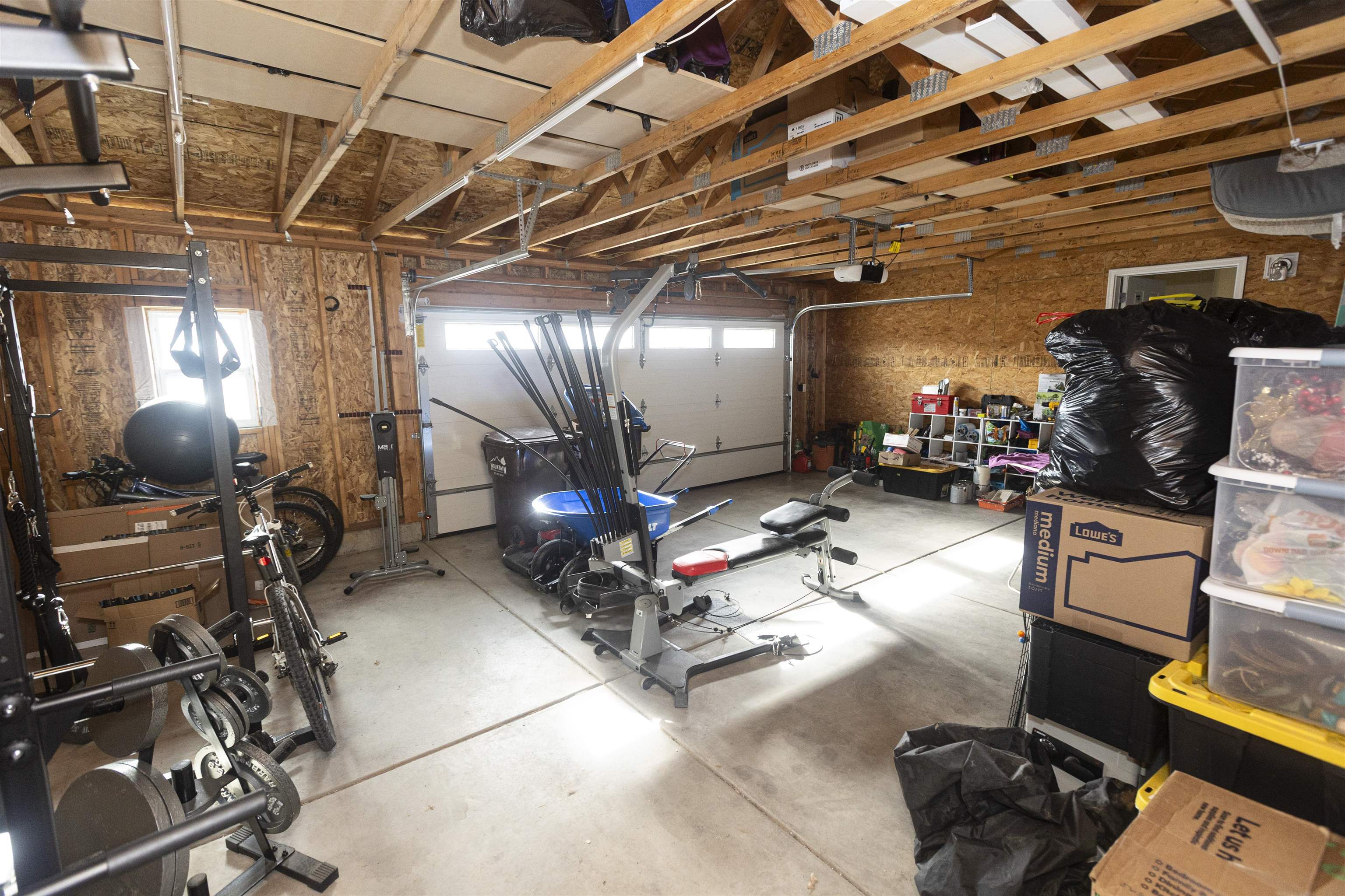 2432 Pioneer Way Rifle, CO 81650 - Photo 15 of 28 a gym room with lots of gym equipment
