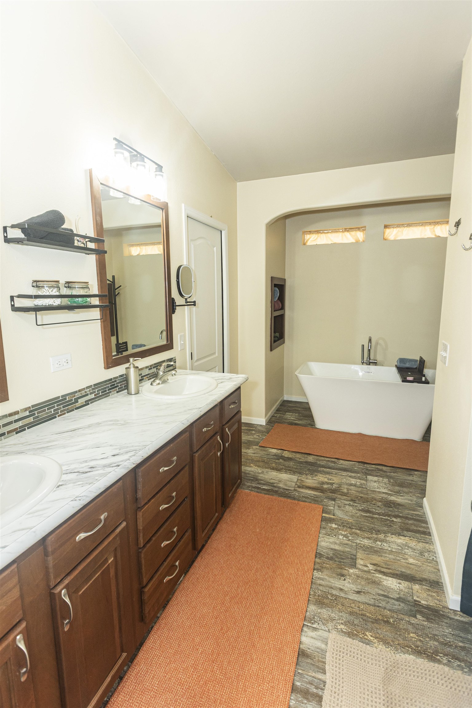 2432 Pioneer Way Rifle, CO 81650 - Photo 23 of 28 a spacious bathroom with a tub sink and mirror
