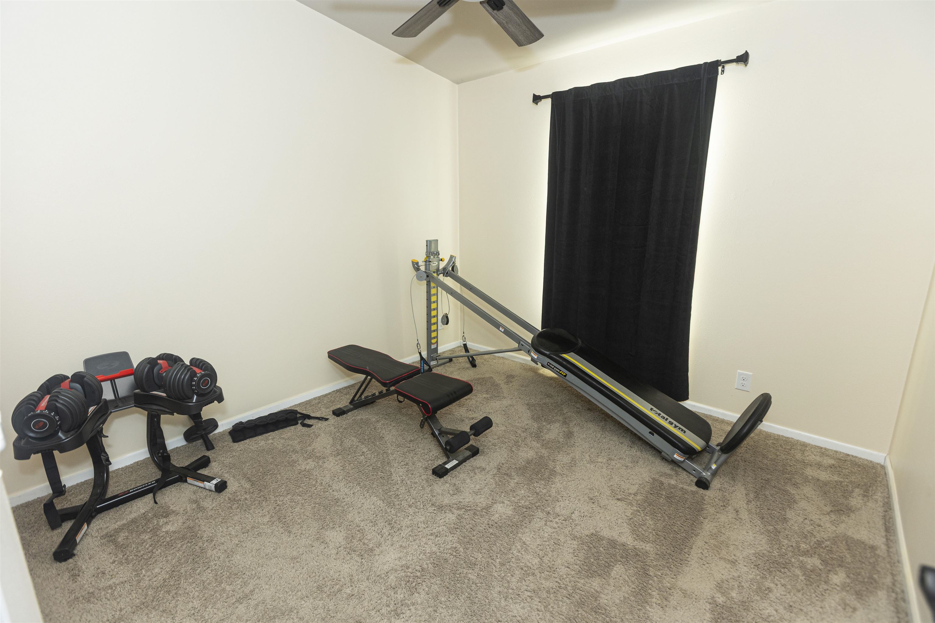 2432 Pioneer Way Rifle, CO 81650 - Photo 9 of 28 a room with gym equipment