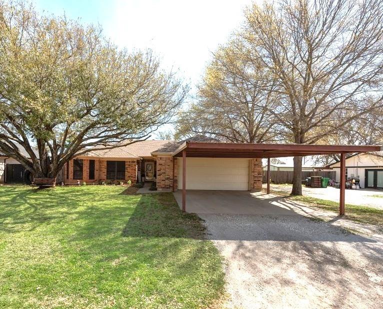 579 South Hitt Street Boyd, TX 76023 - Photo 4 of 34 Beautifully well maintained home! NEW HVAC and GUTTERS! Huge and strongly constructed carport as well as 2 car garage.