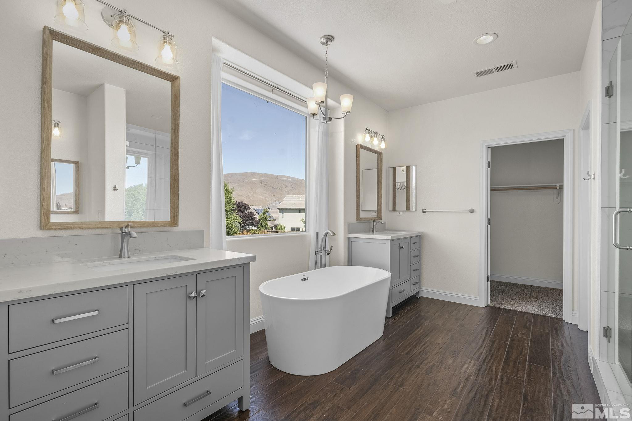 1755 Cavern Drive Reno, NV 89521 - Photo 13 of 25 a bathroom with a sink and a mirror