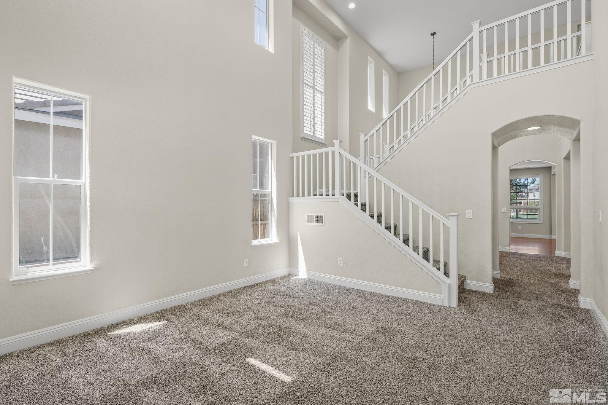 1755 Cavern Drive Reno, NV 89521 - Photo 24 of 25 a view of staircase with white walls and windows