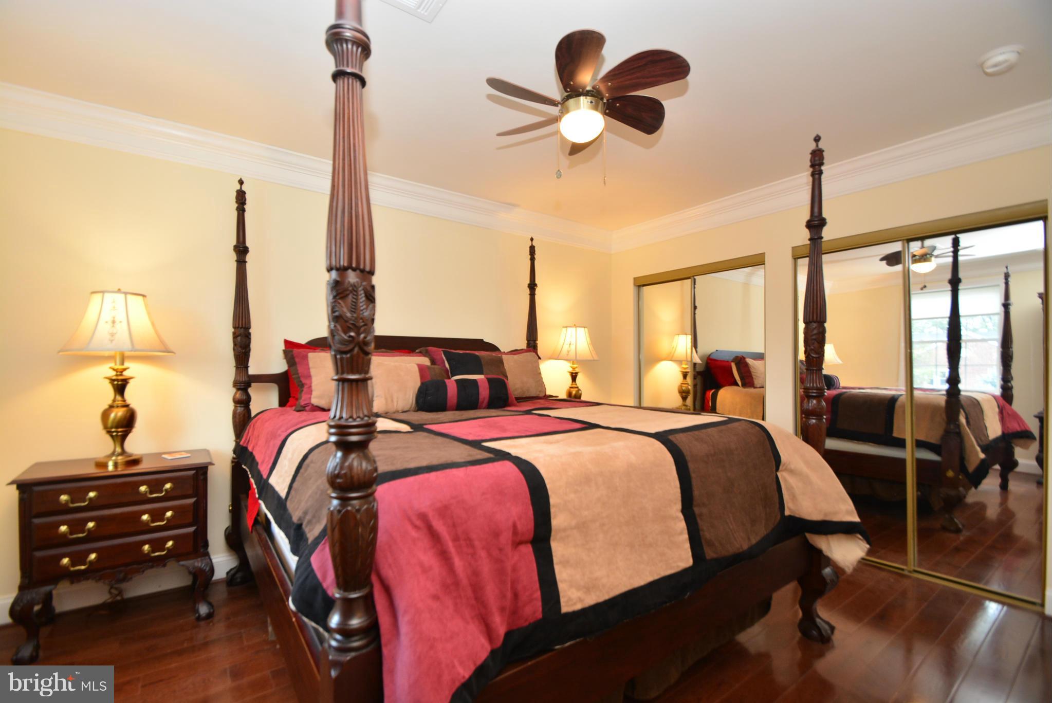 1509 Lochwood Road Baltimore, MD 21218 - Photo 13 of 30 a bed room with two bed and a chandelier