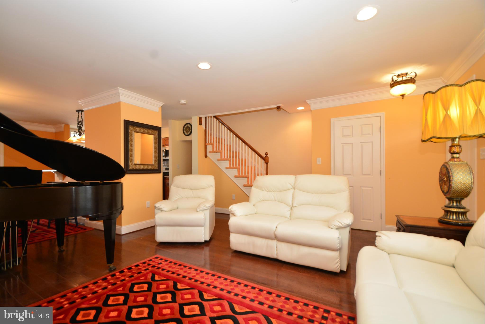 1509 Lochwood Road Baltimore, MD 21218 - Photo 3 of 30 a living room with furniture and a couch