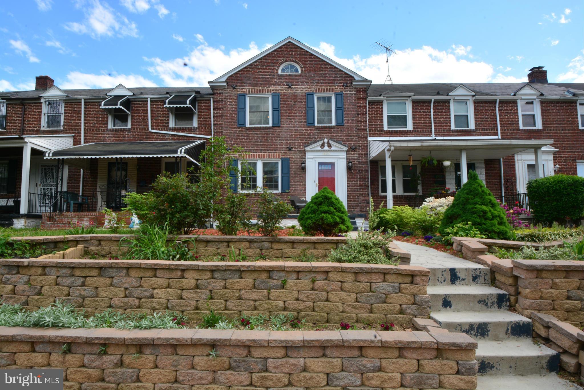 1509 Lochwood Road Baltimore, MD 21218 - Photo 30 of 30 a front view of a house with garden