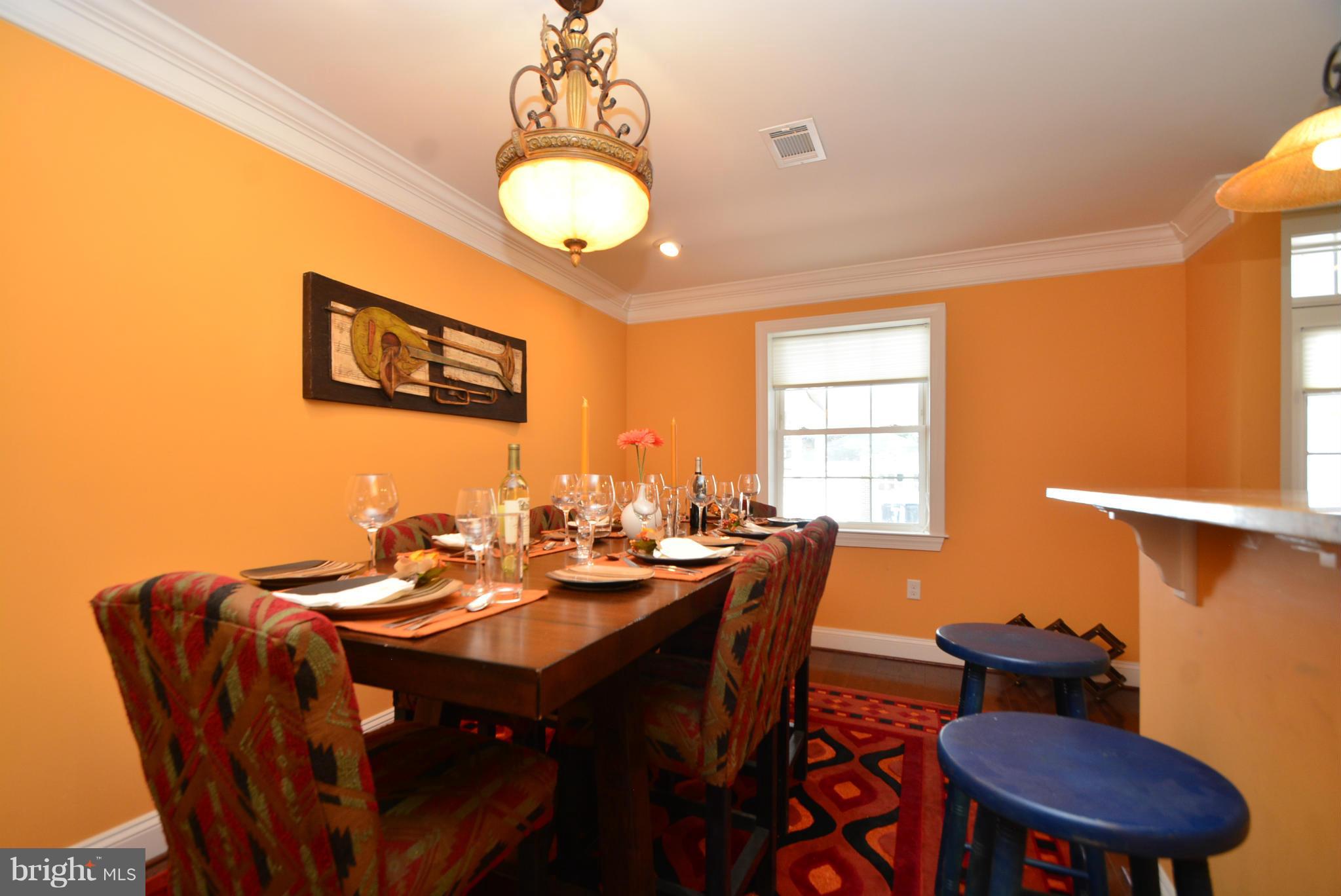 1509 Lochwood Road Baltimore, MD 21218 - Photo 5 of 30 a view of a dining room with furniture and window