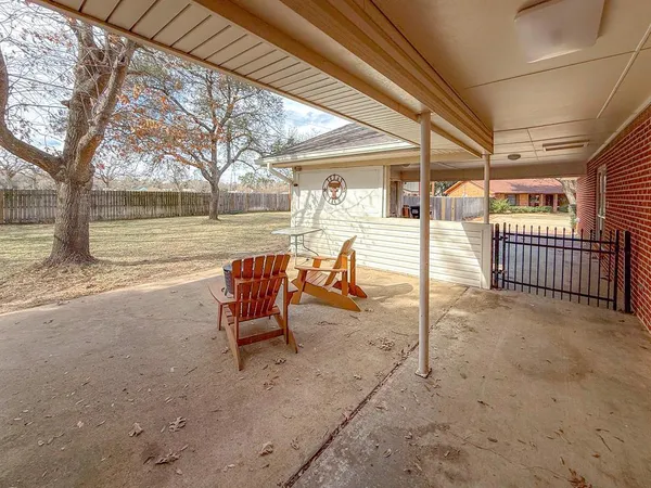 a view of a swimming pool with a lounge chairs