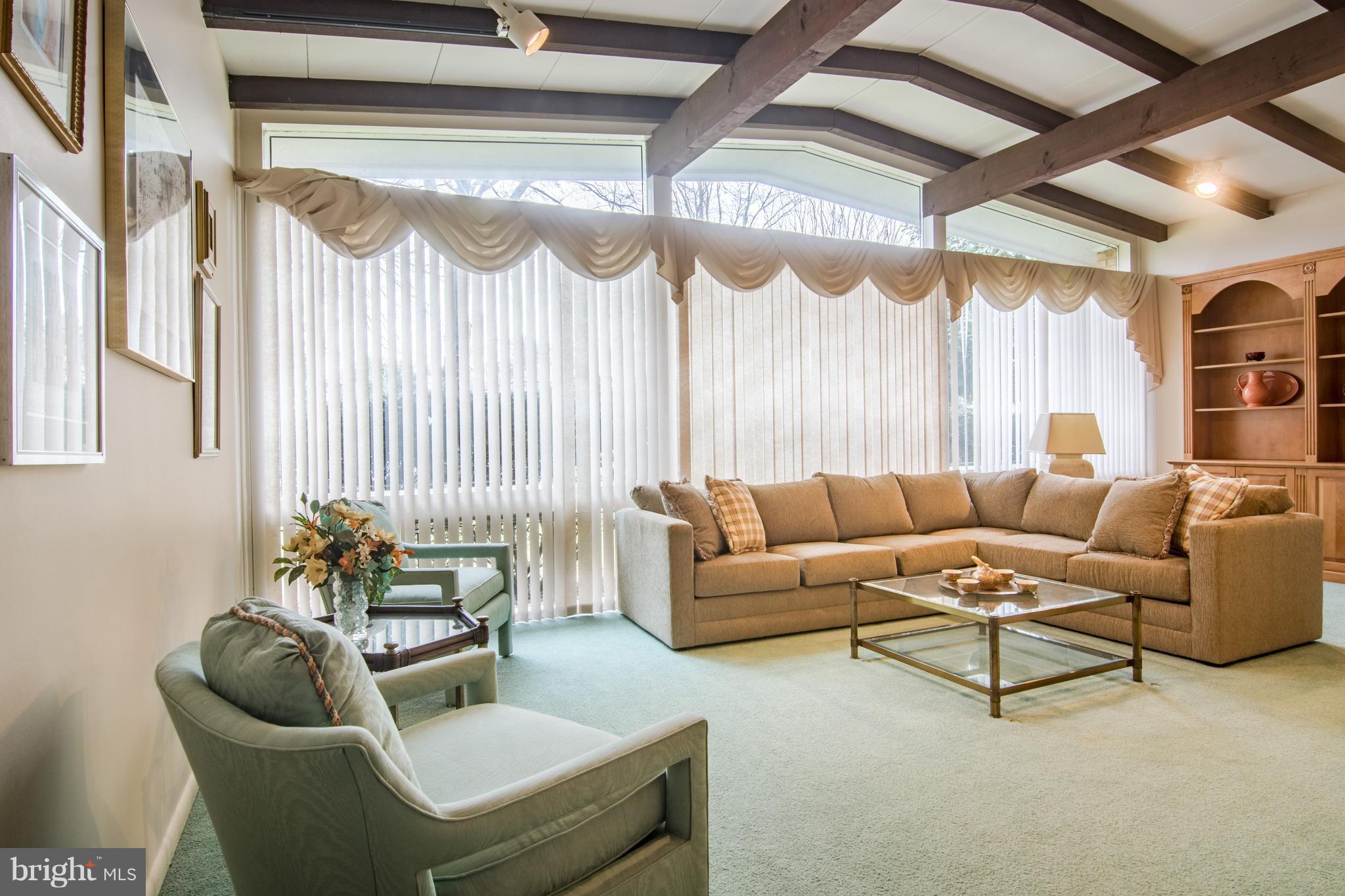 3408 Midfield Road Baltimore, MD 21208 - Photo 5 of 30 BRIGHT LIVING ROOM W/ CATHEDRAL CEILINGS