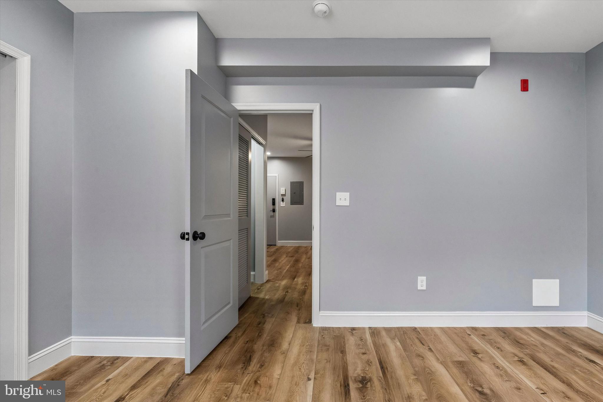 418 South 15th Street, Unit 2F Philadelphia, PA 19146 - Photo 15 of 16 a view of a hallway with wooden floor and closet