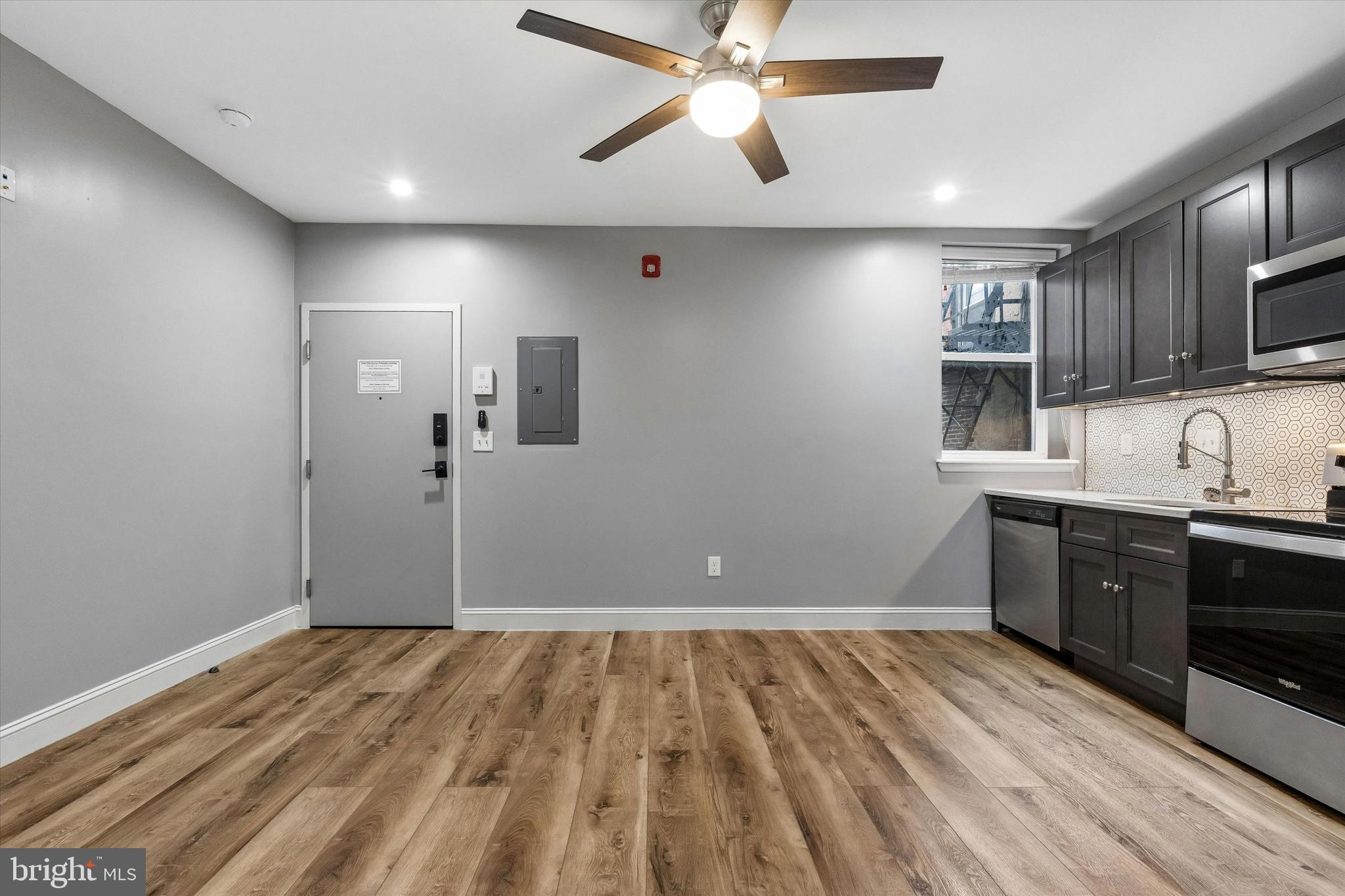 418 South 15th Street, Unit 2F Philadelphia, PA 19146 - Photo 6 of 16 a bathroom with a sink and a mirror