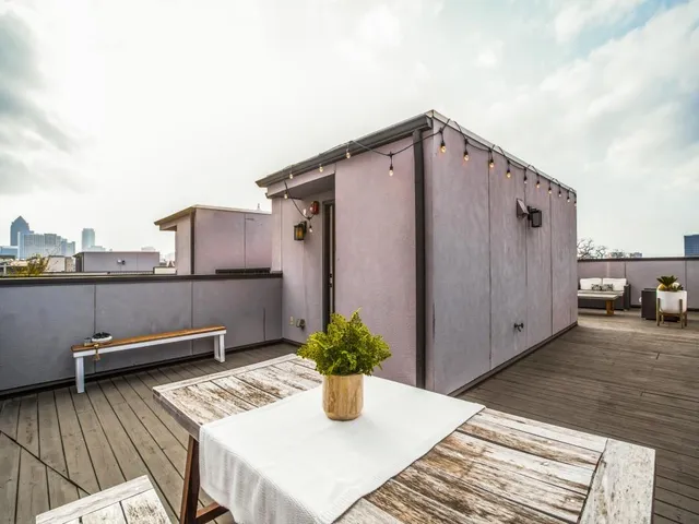a view of a terrace with chairs