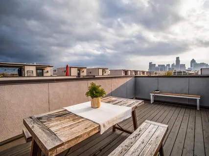 a view of a terrace with sitting area