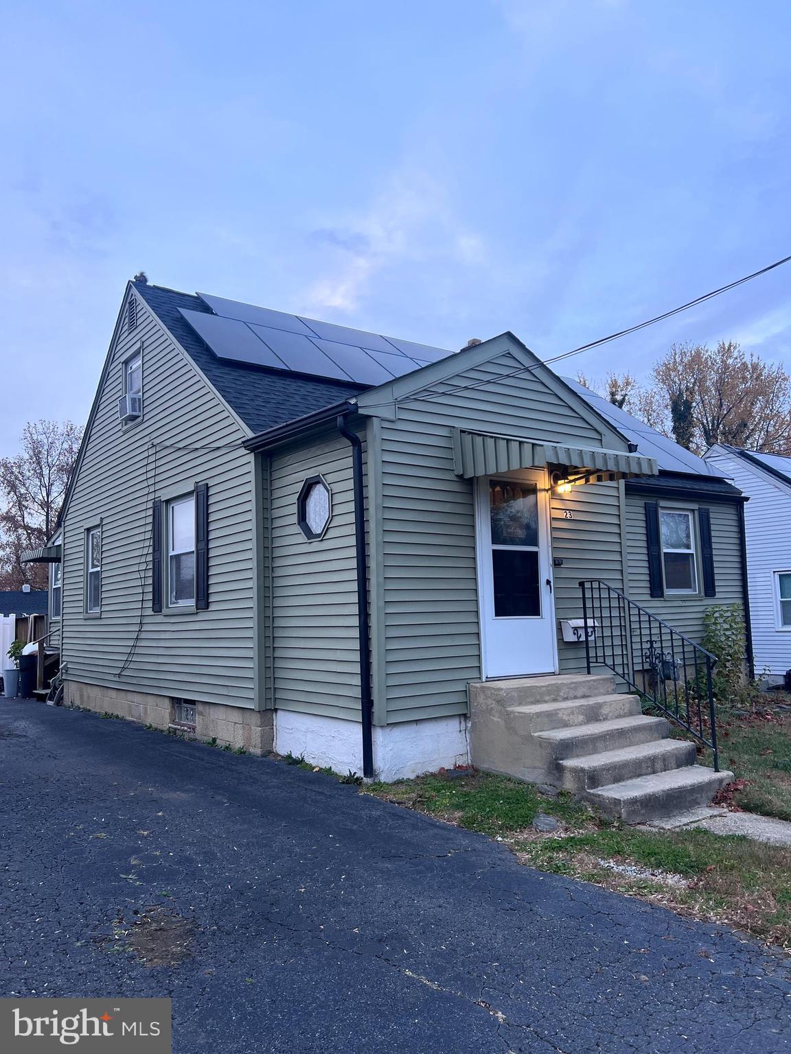 23 East 10th Avenue Runnemede, NJ 08078 - Photo 1 of 11 a front view of a house with a yard