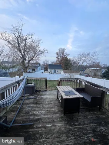 a view of a chairs with wooden deck