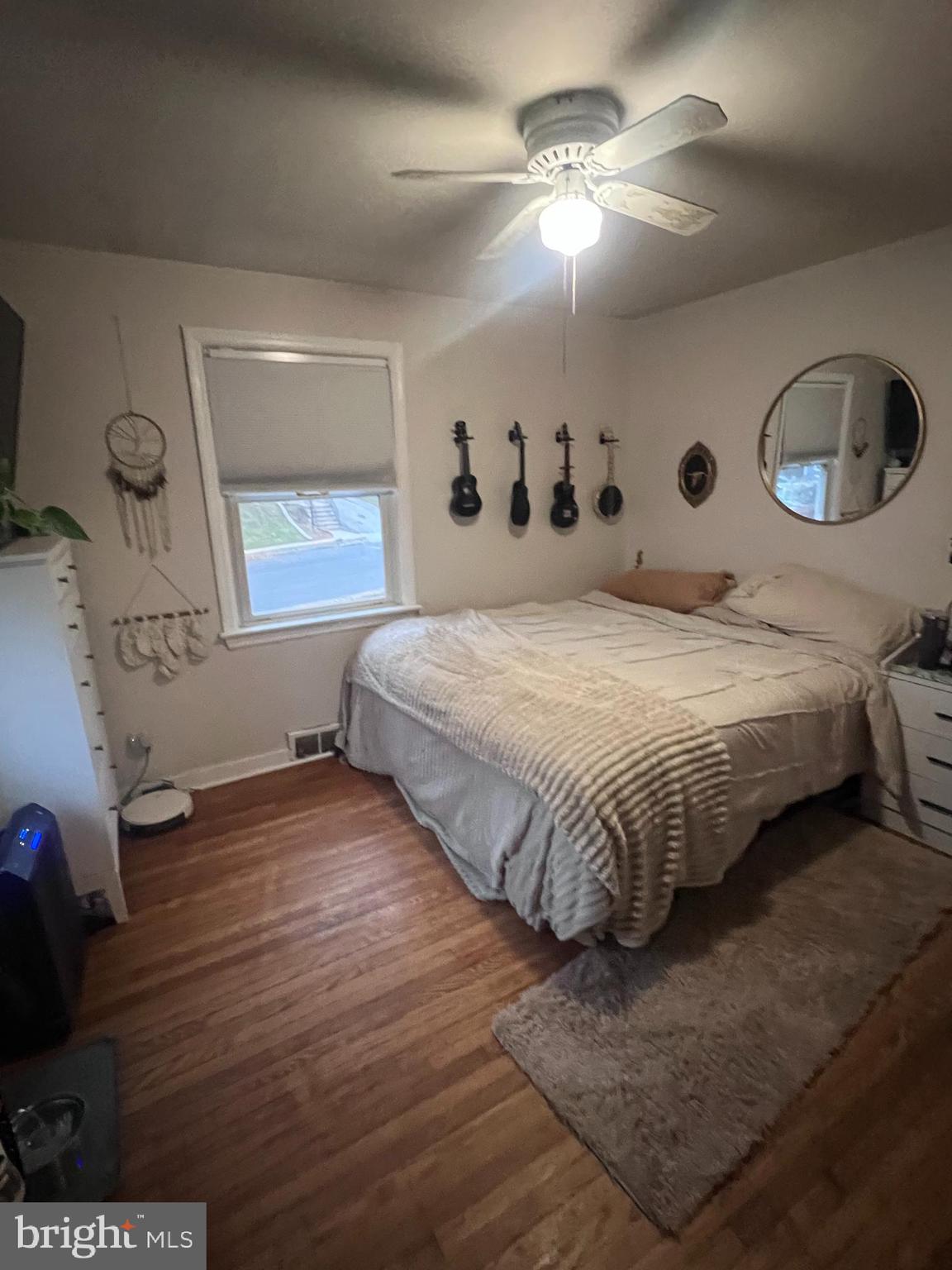 23 East 10th Avenue Runnemede, NJ 08078 - Photo 6 of 11 a bedroom with a bed and a window