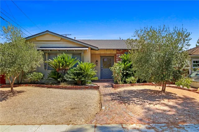 a front view of house with yard