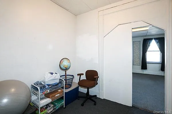 a view of a hallway with washer and dryer