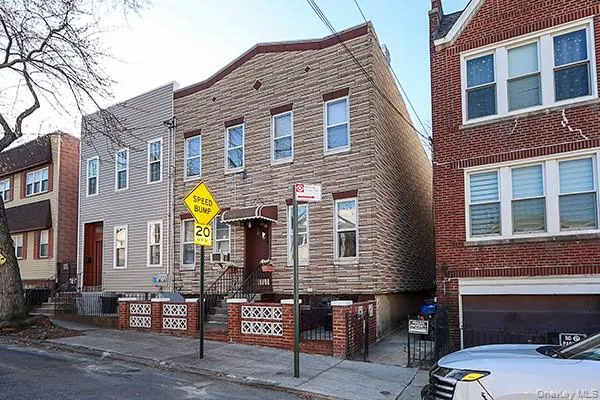 a front view of a house with outdoor space