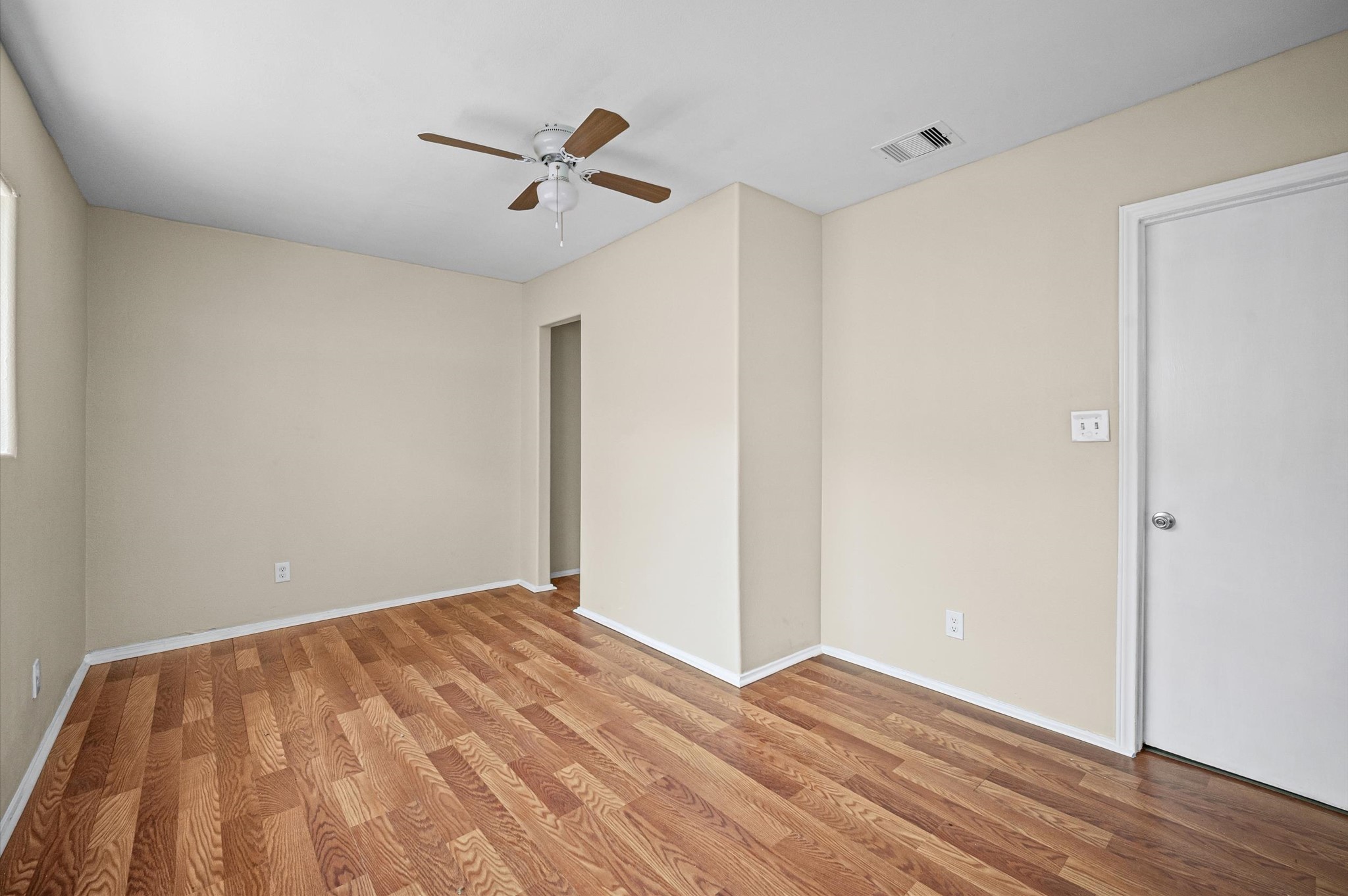 10621 Lane Street Houston, TX 77029 - Photo 19 of 29 a view of empty room with wooden floor